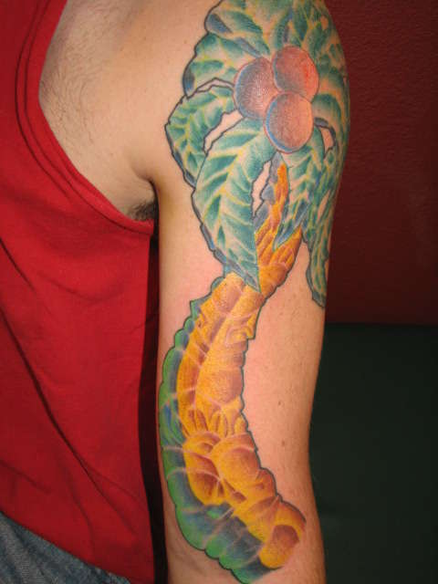 frehand tiki sleeve in progress tattoo
