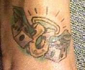 Dice and Wings tattoo