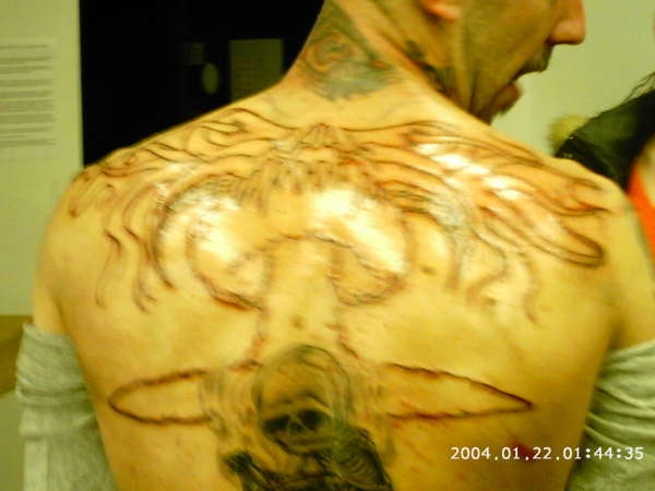 some more of the back piece tattoo
