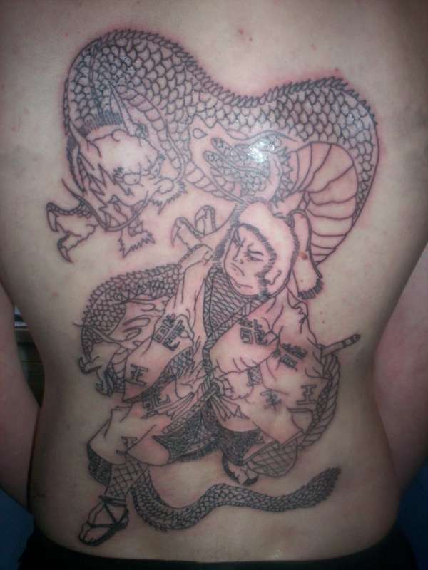 Japanese start of back piece tattoo