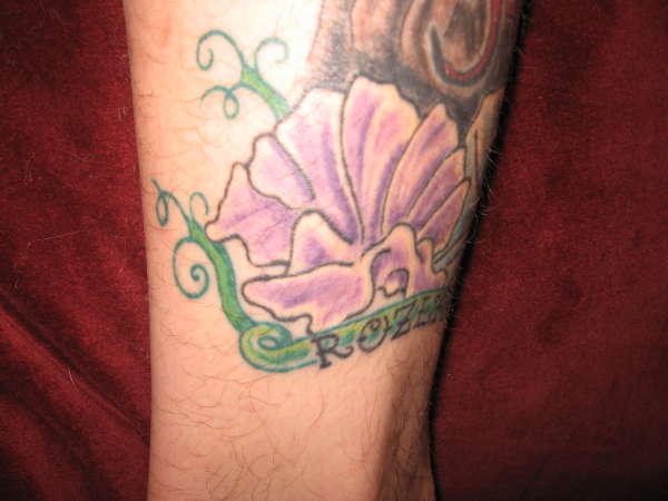 Rozlynn's Sweet Pea Flowers(left) tattoo