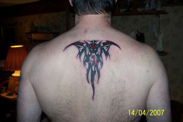 hubbys back Piece tattoo