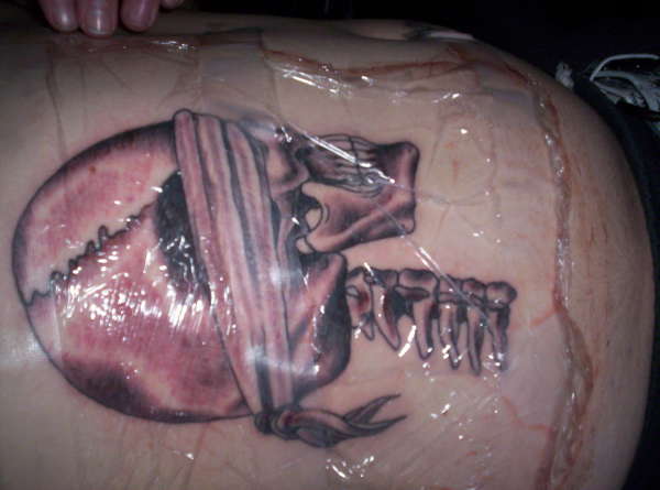 Blindfolded skull tattoo
