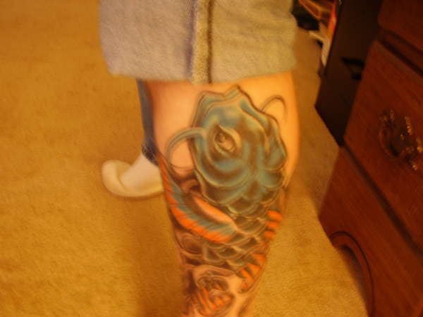 Blue Koi left leg tattoo