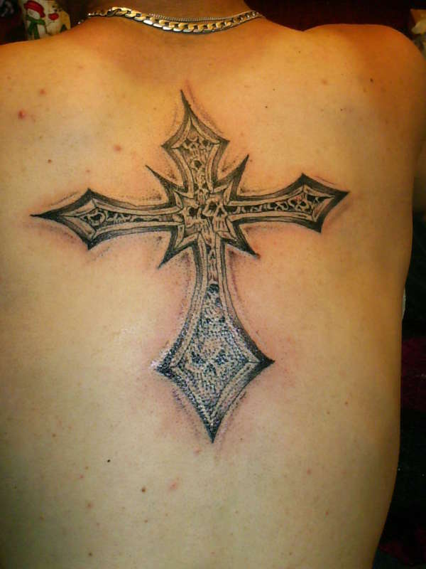 Cross n skulls tattoo