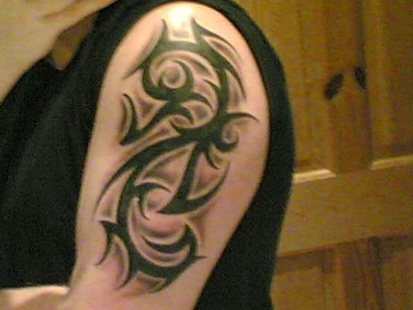 Tribal Normo tattoo