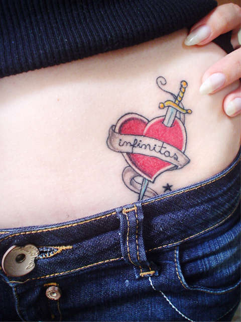 heart with dagger tattoo