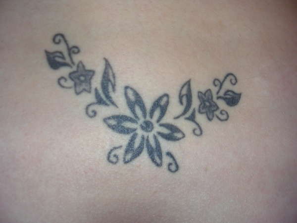 Lower back tattoo