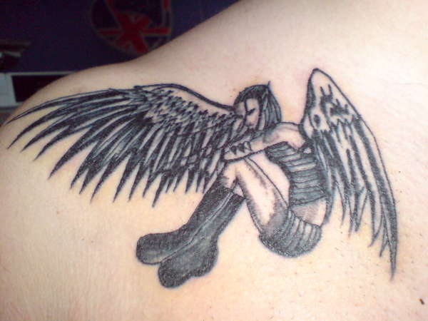 My little angel/fairy on shoulder tattoo