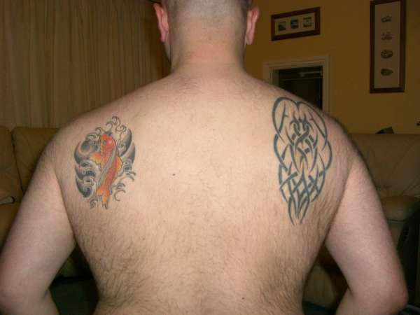 koi carp and tribal tattoo