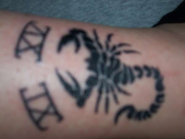 tribal scorpion tattoo