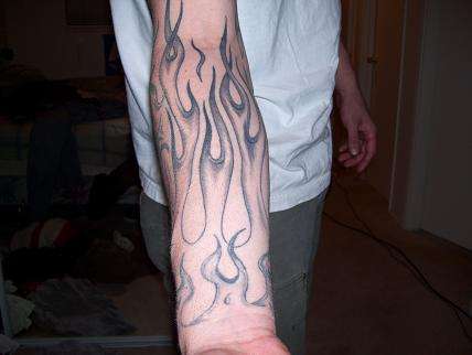 Start of flame sleeve tattoo