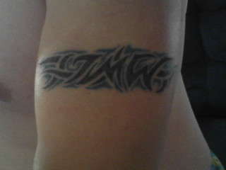 tribal wit int.j.m.w. tattoo