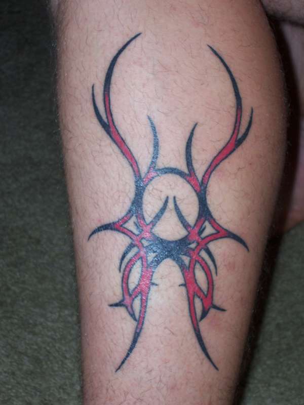 Lower leg tribal tattoo