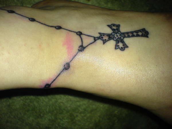 Rosary beads round ankle & on foot tattoo