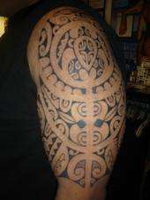 mix of polynesian/marquesian/hawaiian tattoo