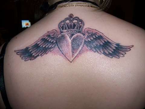 claddagh with wings tattoo