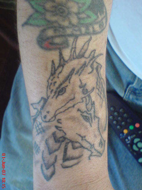 dragons/serpents tattoo