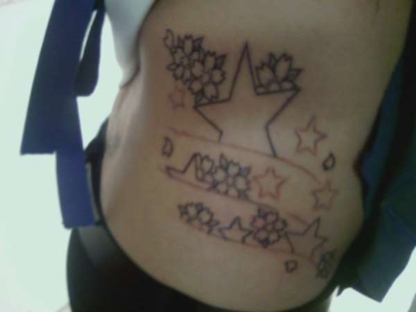 Stars on side tattoo