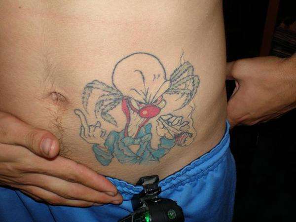 stomach tat tattoo