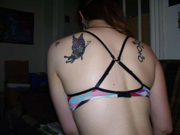 Floral butterfly on my back tattoo
