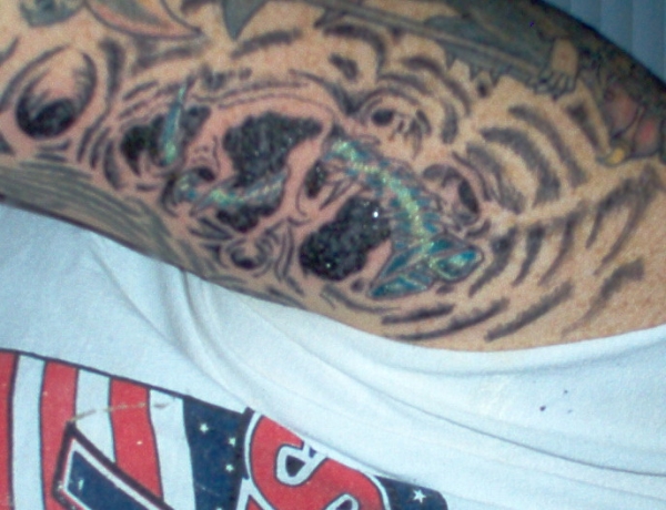 screw tattoo
