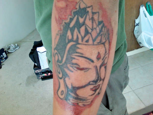 Buddha Head tattoo
