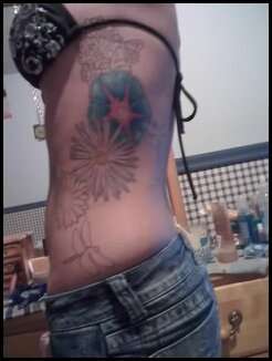 half done flowers tattoo