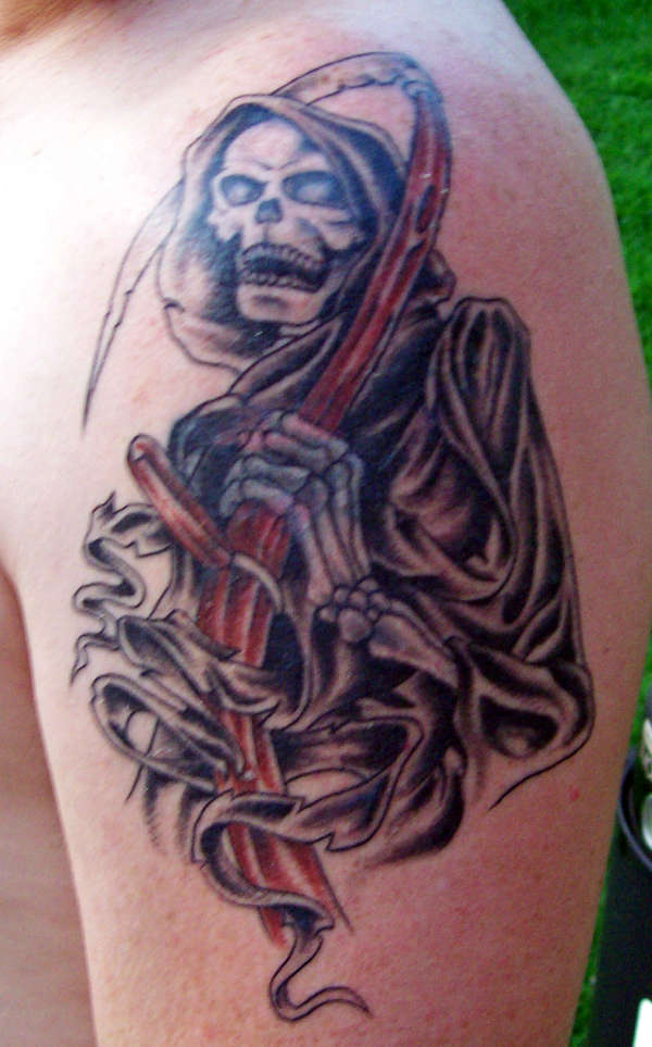 Mc's Reaper tattoo