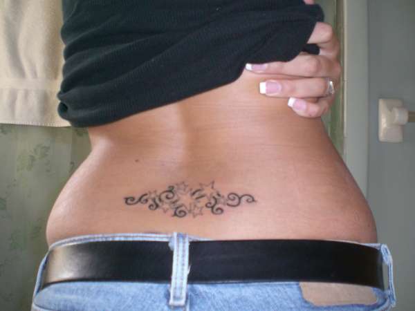 stars on lower back tattoo