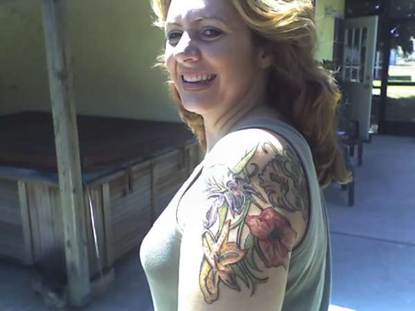 floral back piece tattoo
