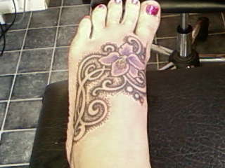 Foot piece tattoo