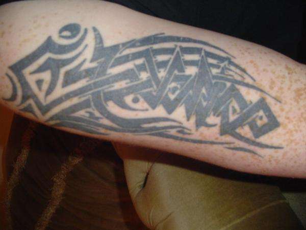 Tribal upper Right Arm tattoo