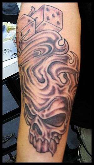 smokey skull tattoo