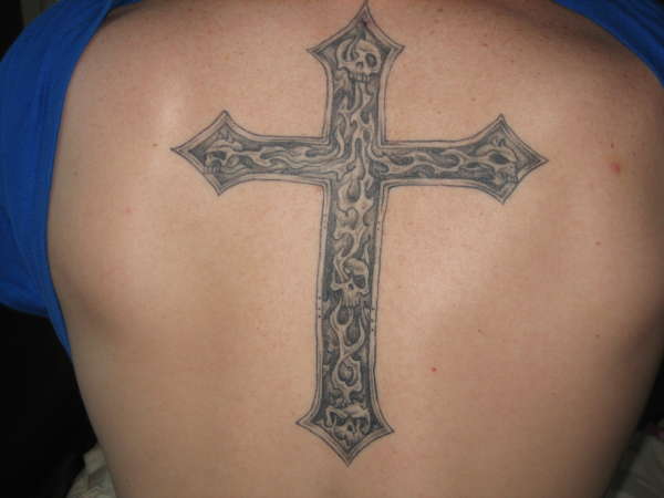 Fire and skull cross tattoo