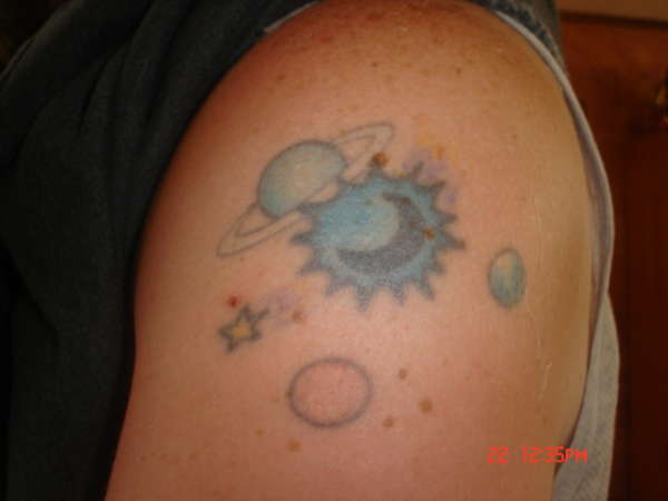 Moon, star, and planets tattoo