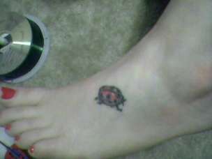 Lady Bug tattoo