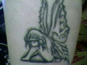 sad fairy tattoo