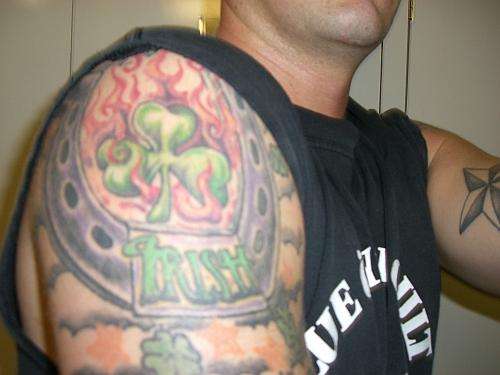 flaming clover tattoo