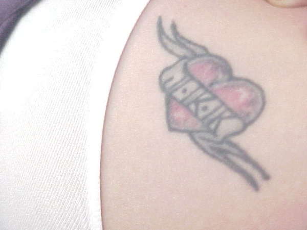 Heart with  banner/initals. tattoo