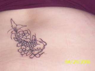 Koi and lotus flowers tattoo