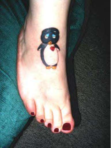 Sad penguin tattoo