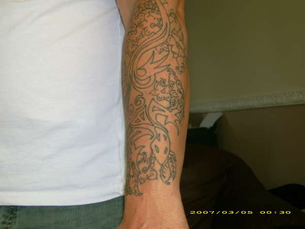start of arm pis tattoo