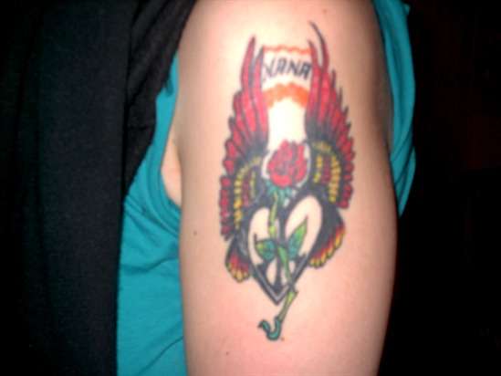 Winged Rose tattoo