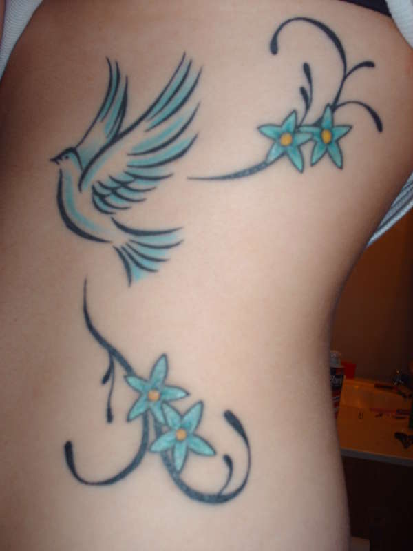 dove and flowers tattoo