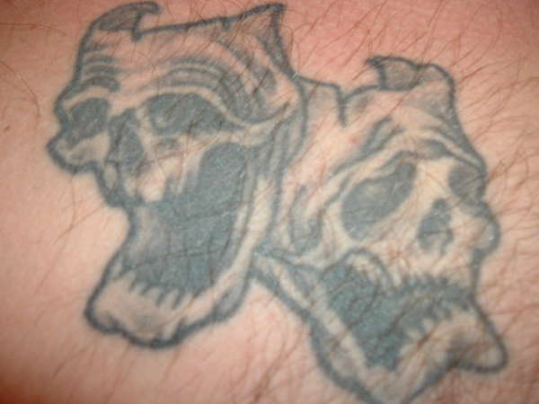 Two Skulls tattoo