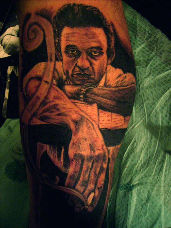 a young Johnny Cash tattoo
