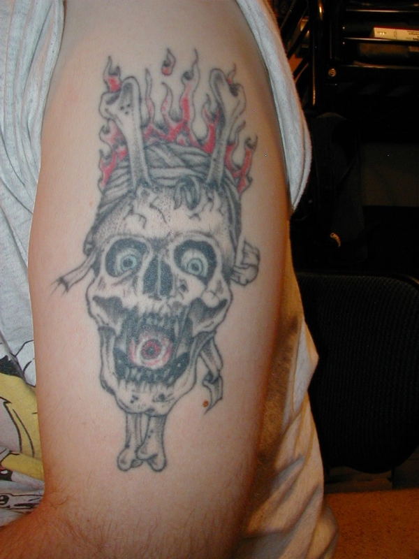 Pus head art tattoo