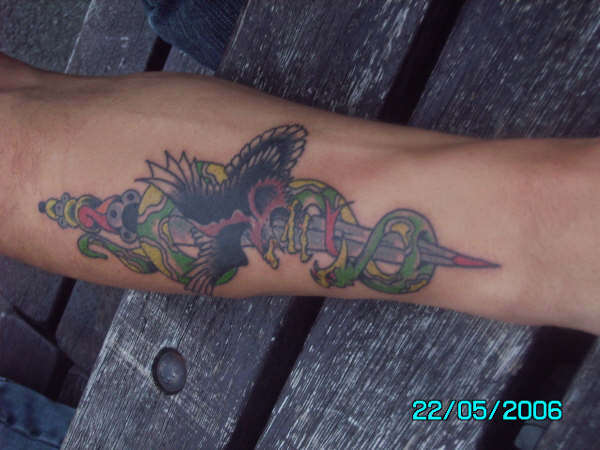 Snake and eagle wrapped round dagger tattoo