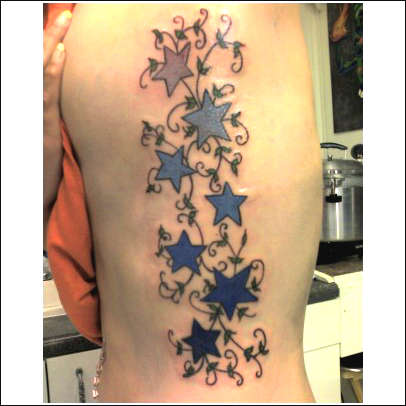 Stars on Female Ribs tattoo